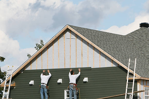 Professional Emergency Siding Repair technician working in Estero, FL